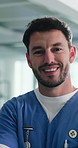 Crossed arms, nurse and face of happy man in hospital for medical service, confidence and healthcare career. Professional, clinic and portrait of person in lobby for wellness, pride and about us