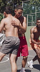 Basketball, challenge and high five with men outdoor for fitness, game or training activity. Exercise, hug and scoring with shirtless people playing on court for skill, technique or sports tournament