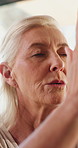 Old woman, namaste and meditation with yoga for wellness, breathing exercise or eyes closed at gym. Elderly person, mudra and holistic fitness with mindfulness, prayer hands or retirement at club