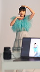 Asian woman, studio and model with photoshoot for fashion, production process and picture bts. Photography, style and behind the scenes with person, media and laptop screen in creative industry