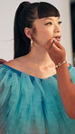 Studio, woman and model with beautician, hands and photoshoot preparation with cosmetics and makeup. Behind the scenes, people and foundation application with tools, creative and beauty or makeover