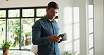 Man, remote work and phone with coffee at house for real estate, property research and listing. Thinking, realtor and beverage with mobile, email client and viewing information for resale opportunity