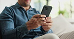 Typing, text and hands in house with phone, post reaction and communication on email platform. Digital, chatting and man in living room with tech, social media update and message on online app.