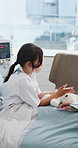 Girl, patient and doctor with teddy bear on hospital bed for medical checkup or healthcare service. Child, kid or playing with stuffed animal for emotional comfort or distraction in clinic room