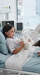 Girl, father and doctor on tablet at hospital bed with talk, report and update for recovery with illness. People, pediatrician and dad with child patient, tech or app for healing process at clinic