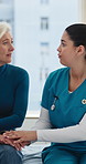 Consultation, nurse and sad woman in hospital, talking and feedback for disease diagnosis. Comfort, doctor and mature patient in clinic for test results, appointment and empathy for bad news and help