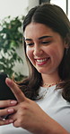 Home, funny and happy woman with smartphone for texting and digital app for online humor. Apartment, communication and person in living room, comedy video or cellphone for connection or website info