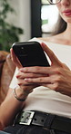 Phone, hands and woman typing in home with app, check message and response on internet forum. Mobile, communication and person relax in living room, online platform and notification for social media