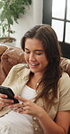 Smile, typing and woman on sofa, smartphone for texting and digital app for social media. Home, scroll and happy person on couch, message or cellphone for connection, email or positive feedback
