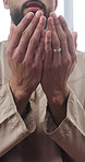 Muslim man, hands or praying with dua for worship, faith or spiritual connection with allah in home. Islam, male person or blessing with islamic belief, holy religion or praise god for forgiveness