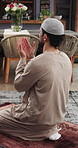 Home, prayer and muslim man with dua for worship, faith and praise Allah for gratitude. Islam, spiritual and person in house for praying, devotion and salah for holy religion with peace on Ramadan