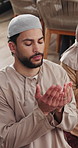 Prayer, home and Islamic man in lounge, religion and worship for peace, gratitude and hope. Apartment, belief and Muslim person in living room, spiritual and ramadan kareem with trust in God or Allah