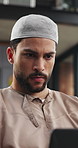 Muslim man, laptop and thinking with remote work for review, decision or project management in lounge. Islamic person, computer and insight for business proposal, feedback and freelance job in house