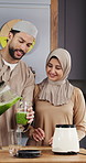 Muslim couple, blender and smoothie in kitchen for breakfast shake, digestion or health benefits. Islamic people, love and green beverage in home for nutrition, meal replacement and conversation