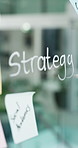 Glass, writing and business person with strategy for social media campaign, planning and digital marketing. Creative, office and worker with sticky notes, ideas and brainstorming for research project