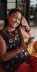 Funny, typing and woman in lounge, smartphone for communication and app for social media. Home, laughing or mature person with online reading, humor or cellphone for connection and message to contact