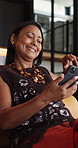 Smile, relax and woman in lounge, smartphone for texting and digital app for online humor. Home, laughing and mature person with joke, funny meme or cellphone for connection, typing and communication