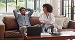 Talk, couple and paper in home for debt, bankruptcy or discussion for financial crisis with laptop. Interracial man, woman and document for bills on computer, expenses or stress for mortgage cost