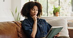 Thinking, woman and scroll on tablet, lounge and writer with freelance project, online and creative. Reflection, remote work and African person with tech in home and planning for social media script