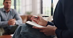 Hands, notebook and talk with psychologist for counseling, stress or mental health assessment. Therapist, client and consulting with notes for support, help or listen to person with anxiety in office