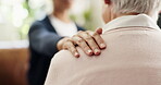 Caregiver, shoulder touch or hands in house with comfort, understanding or empathy in retirement care. Compassion, security or elderly person in home with help, support and trust in assisted living.