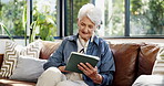 Relax, scrolling and tablet with old woman on sofa in home for connection or social media browsing. App, search and smile with happy senior person in living room of apartment for break or retirement