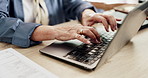 Typing, laptop and hands of senior person in home for communication, online search or replying to email. Closeup, tech and pensioner for retirement, networking or post comment on website in house