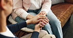 Caregiver, holding hands and women in home with trust, understanding or help in retirement care. Compassion, security or elderly person in house with comfort, support and empathy  in assisted living.