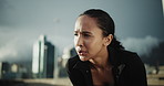 Tired, woman and rest for fitness in city with burnout, deep breathing and exercise break. Low angle, exhausted or female person with fatigue, intense training and runner recovery from sports workout