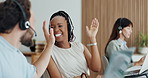 High five, call center and team with business woman in office for customer support, kpi target and success. Virtual advisor, coworking and consultant bonus with employees for telecom promotion
