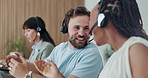 Call center, headset and smile with business people in conversation for feedback, problem solving or support. Communication, customer service and happy with agent in office for assistance or help