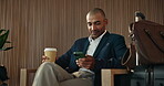Phone, texting and business man in airport lounge for layover notice, flight schedule and contact. Communication, boarding pass and travel update with person and tech in lobby for waiting room