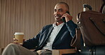 Phone call, coffee and business man in airport lounge for layover notice, flight schedule and contact. Communication, boarding pass and travel update with person and tech in lobby for waiting room