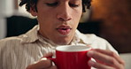 Coffee, blow and man in home for calm, peaceful or relax on weekend morning in living room. Scent, cool down and male person with warm beverage in mug for break with espresso aroma in apartment.