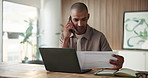 Phone call, paperwork and business man on laptop for consulting, feedback and client portfolio. Office, documents and person on smartphone for conversation, talking and communication for proposal