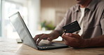 Credit card, laptop and hands of man in office for online payment, internet banking and purchase. Startup, ecommerce and person with debit info on computer for business transaction, expense or budget