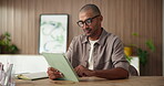 Creative, tablet and man with glasses, office and research for ad campaign on website or copywriting. Online, scroll and person with technology for article, email marketing and happy with project