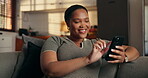 Phone, relax and smile with black woman on sofa for ebook subscription, scroll and contact. Digital reading app, online blog and communication with person in living room of home for weekend break