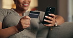 Credit card, phone and hands of woman on sofa for online shopping, website store and digital purchase. Home, smartphone and happy person on bank app for ecommerce, payment and subscription for sale