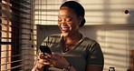 Happy, typing and black woman with phone in kitchen for social media, online message and chat. Morning, home and person on smartphone with notification for communication, connection and internet