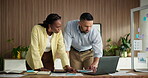 Finance, review or team in office with laptop, partnership or discussion on revenue growth. Collaboration, graphs or sales analyst in agency with tech, budget plan or feedback in performance analysis
