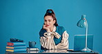 Face, creative writer and happy woman at desk in studio, copywriting and freelancer on blue background. Mockup space, journalist and person with career pursuit, fashion magazine editor and confidence