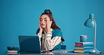 Stress, creative writer and woman in studio, headache for health crisis and pain on blue background. Person, tired and journalist at desk, migraine and burnout with fatigue, brain fog and exhausted