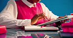 Business woman, scroll and tablet in studio for planning, productivity and project management. Aesthetic, journalist and employee with tech, research and creative publisher on blue background