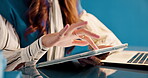 Business woman, typing and tablet in studio for planning, productivity and project management. Aesthetic, journalist and employee with laptop, research and creative publisher on blue background