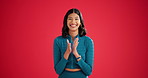 Happy woman, sports and excited in studio for congratulations, winning or success. Female person, personal trainer or applause with wow for thank you, support and mockup space on red background