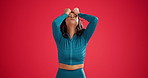 Fitness, frustrated and woman in studio with headache for exercise, training issue or gym error. Stress, personal trainer and angry with mad, breathe and mockup space isolated on red background