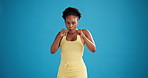 Fitness, boxing and face of black woman in studio with workout, training or energy for wellness. Health, sport and portrait of African female person with cardio exercise for active by blue background