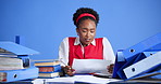 Stress, files and black woman with documents for overworked, burnout or fatigue with finance project. Paperwork, exhaustion and African female financial advisor with chaos by blue background.