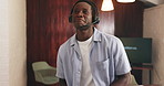 Call center, headphones and black man in office, talking and contact us for customer support. Help desk, consulting and African person in workplace, conversation and negotiation for insurance sales